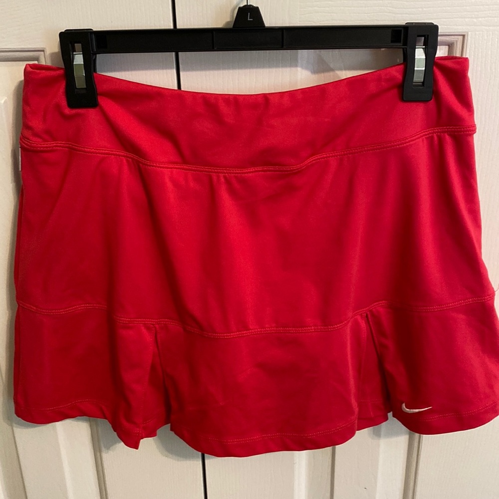 Nike, tennis skirt. Pretty pink athletic wear